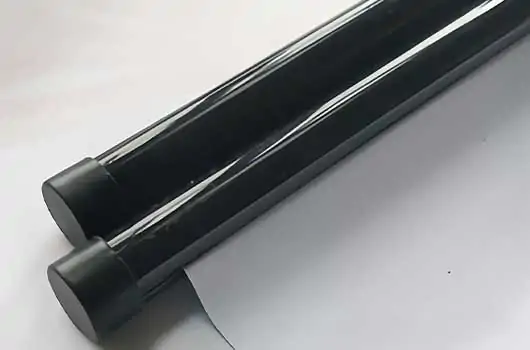 Black plastic scroll